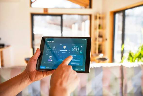 Lifestyle example of home controls on a handheld tablet